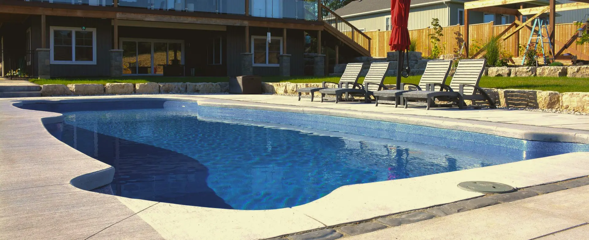Backyard inground pool built by Railway City Pools & Spas