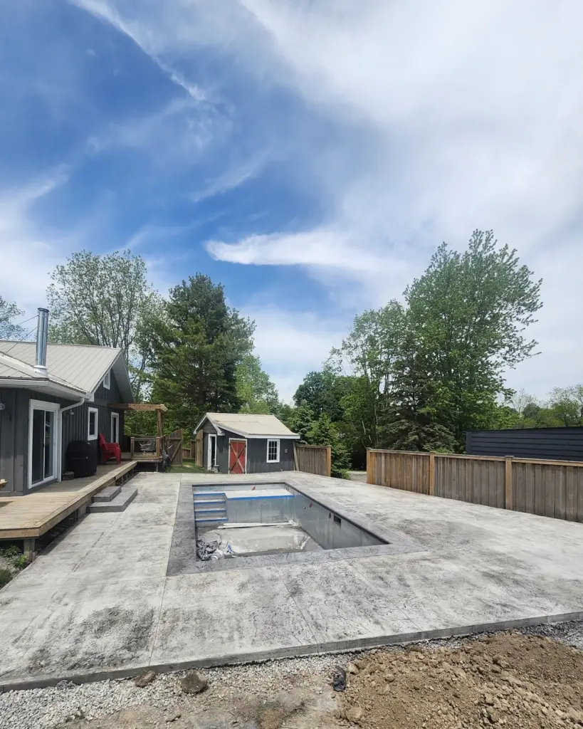 The pool: Stamped concrete deck