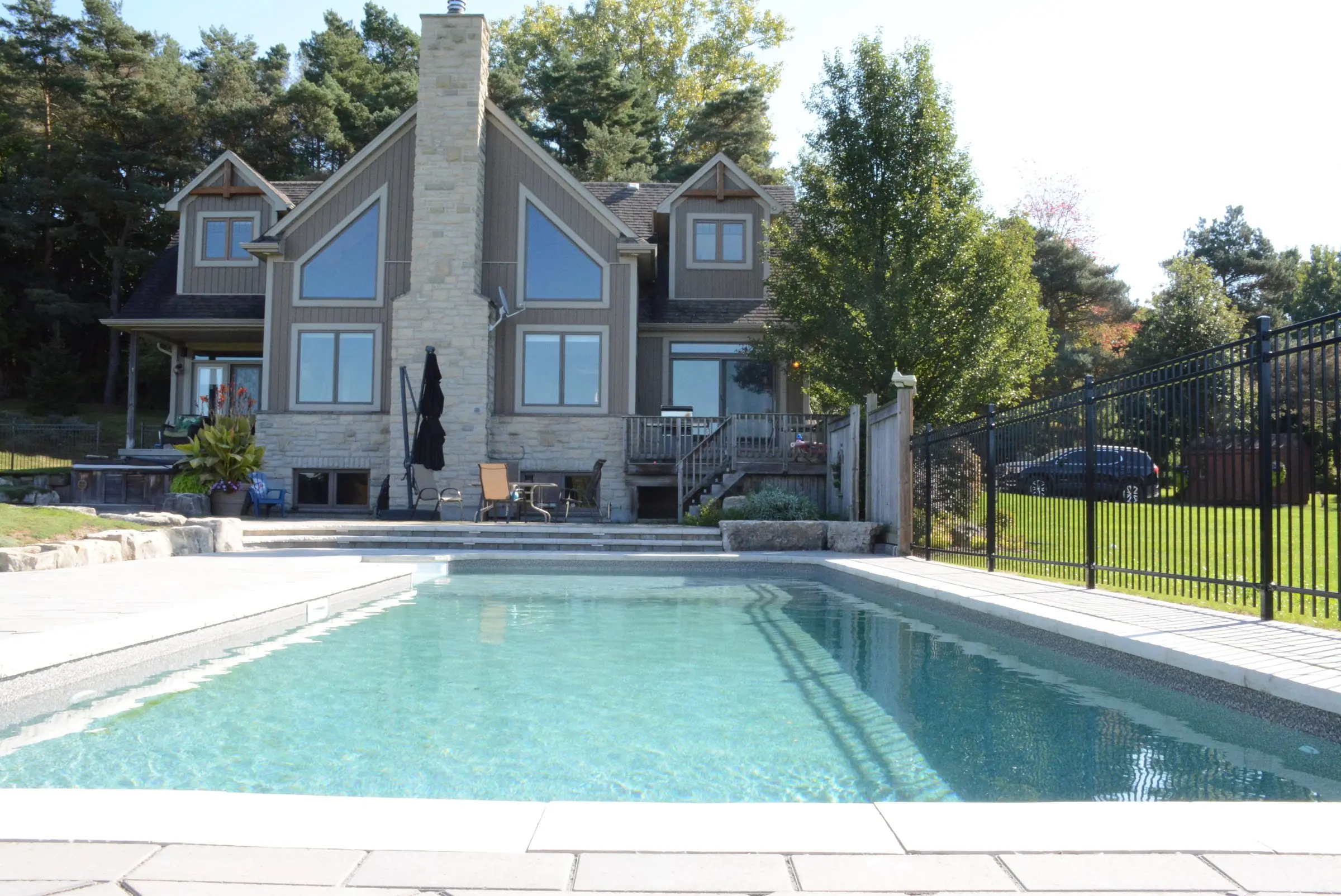 Rectangular inground pool with paver deck
