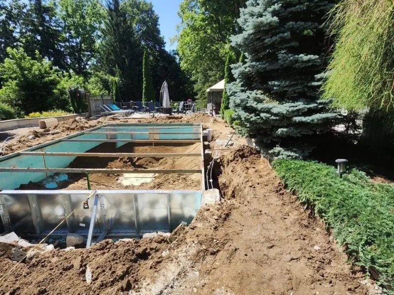 Old pool removed and new steel walls going in