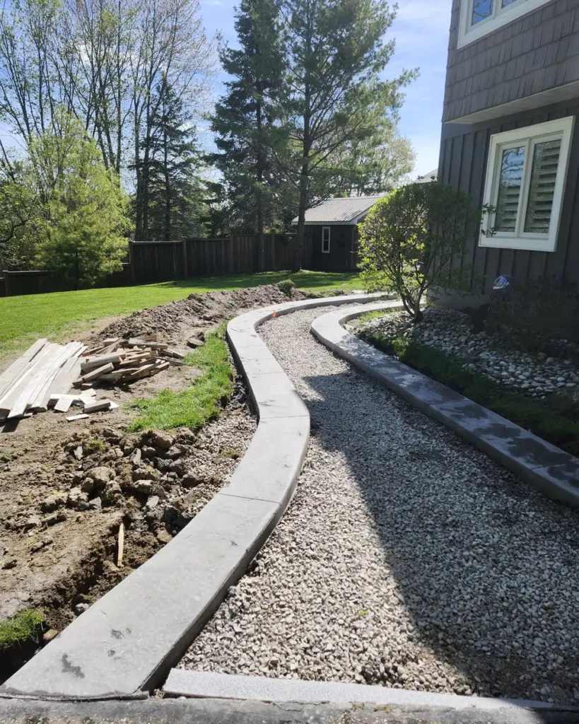 The walkway: Curbs poured